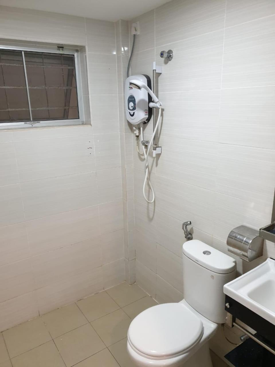 Angsoka Hotel Телук-Интан Экстерьер фото