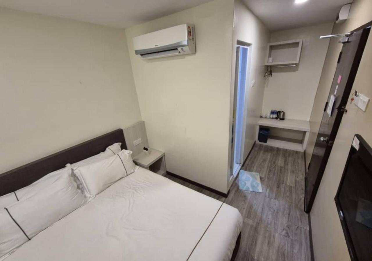 Angsoka Hotel Телук-Интан Экстерьер фото
