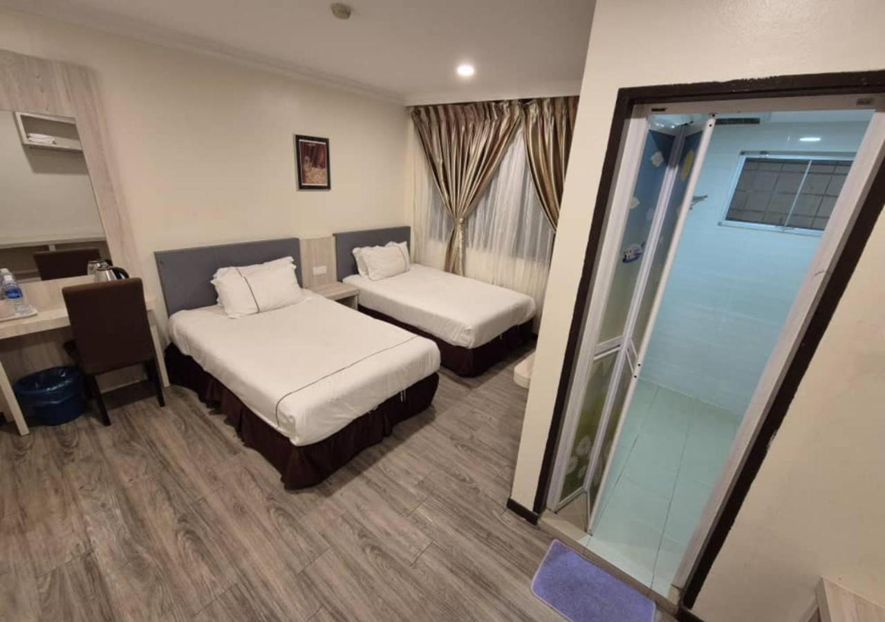 Angsoka Hotel Телук-Интан Экстерьер фото