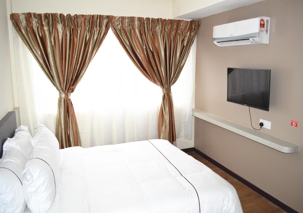 Angsoka Hotel Телук-Интан Экстерьер фото