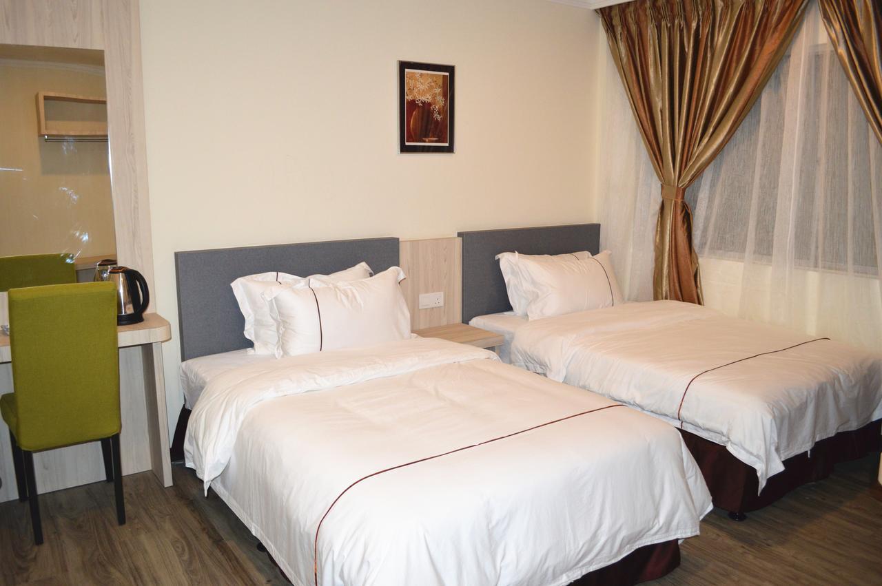 Angsoka Hotel Телук-Интан Экстерьер фото