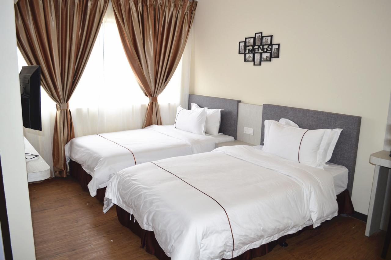 Angsoka Hotel Телук-Интан Экстерьер фото