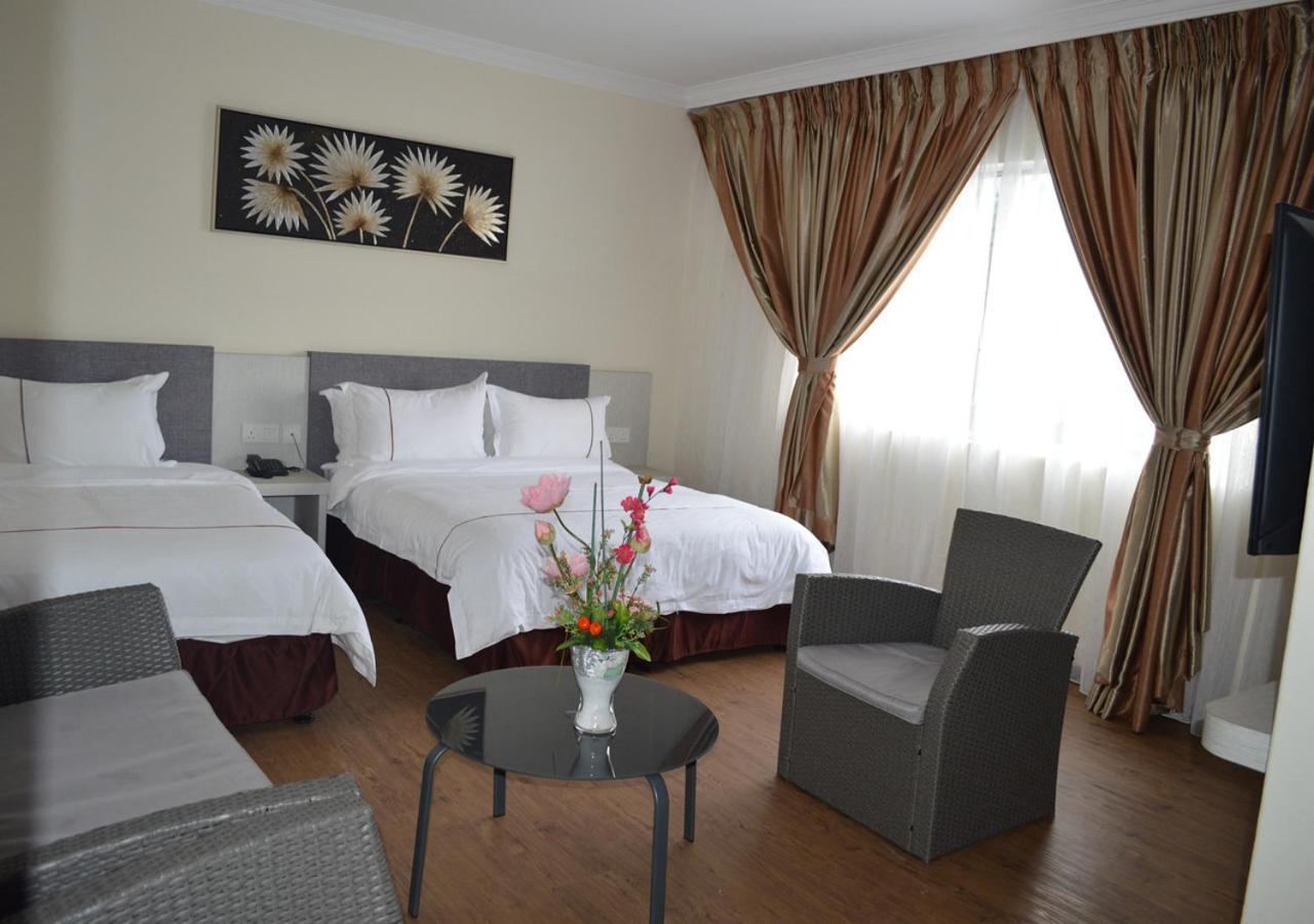 Angsoka Hotel Телук-Интан Экстерьер фото